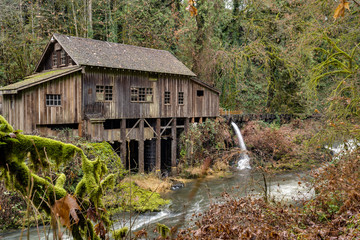Historic mill alongside a creek in the Pacific Northwest