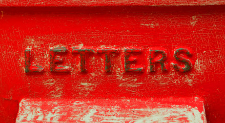 Retro red letter box with crackled paint