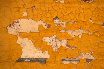 Rustic yellow crackled paint background