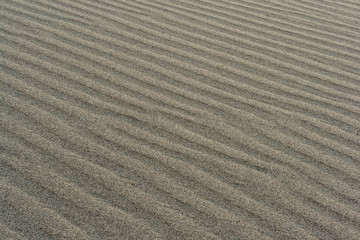 Fototapeta na wymiar rippled sand texture