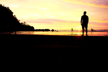 silhouette of man on the beach - 250562608