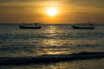 Fototapeta na wymiar Sunset view on the beach of Jimbaran in Bali, Indonesia