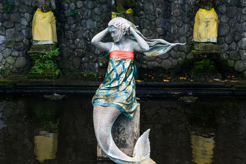 statue of mermaid in garden of Bali, Indonesia