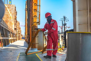 fireman prepare hose fire rubber standing by in the job site, ready to apply at once in case...