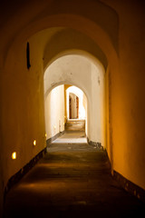 Fototapeta na wymiar Narrow white washed passageway in the town of Amalfi on the Amalfi Coast, Southern Italy