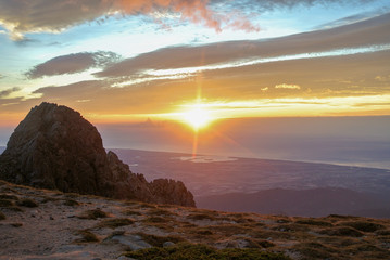 Awesome sunrise view from the GR20 in Corsica, france, from the mountain down to the beach