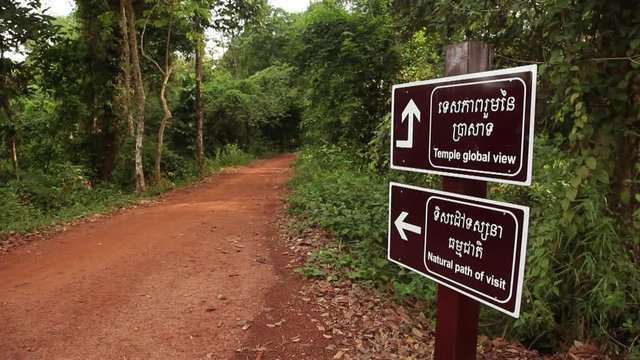 WS Rear view of man on path leading to temple / Angkor Wat, Siem Reap, Cambodia