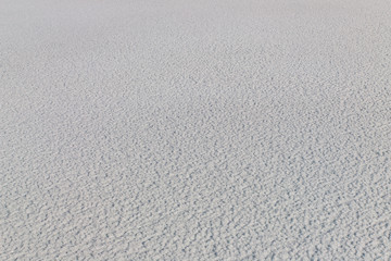 The snow surface with large ice crystals. Winter background.