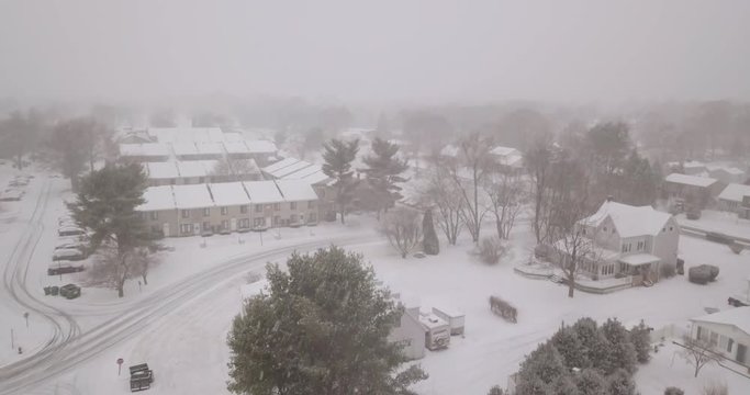 Drone over town home snow storm