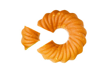 Delicious vanilla ring cake on white background.