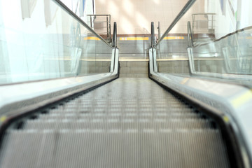 Escalator empty of people and humans