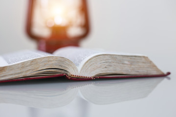 Open bible on desk,book