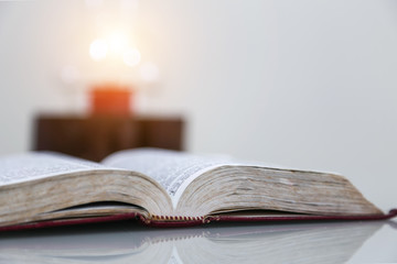 Open bible on desk,book