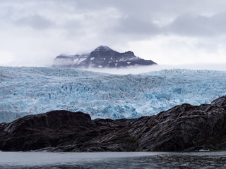 Glacier and mountain in Archipelago of Svalbard, Norway