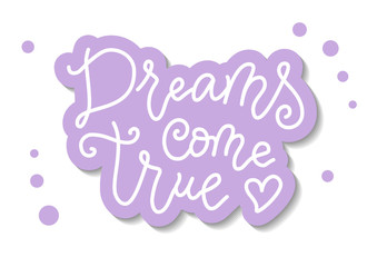 Modern calligraphy lettering of Dreams come true in white with purple outline on white background with dots for decoration, poster, banner, postcard, greeting card, gift tag, present, holiday