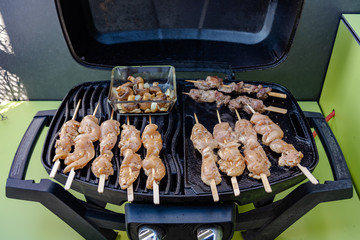 BBQ on an gas-grill on an outdoor kitchen