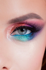 Bright eye makeup. Pink and blue color, colored eyeshadow.