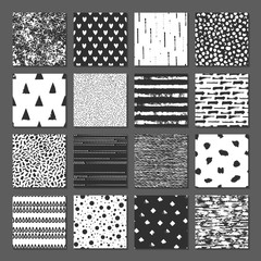 Set of 16 seamless pattern. Drops, points, lines, stripes, circles, squares, rectangles. Abstract forms drawn a wide pen and ink. Backgrounds in black and white. Hand drawn. Vector illustration.