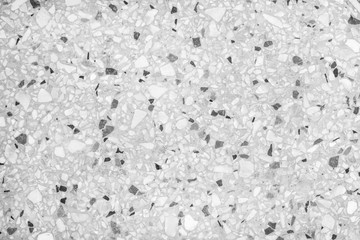 Old terrazzo flooring in seamless patterns texture , polished light gray, black and white stone for...