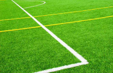 Obraz premium Geometric lines on green football field. Abstract sport texture.