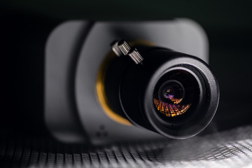 Fototapeta na wymiar CCTV Security Camera. Video camera lens closeup