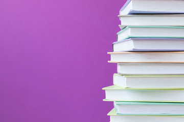 Stack of colorful books. Education background. Back to school. Copy space for text