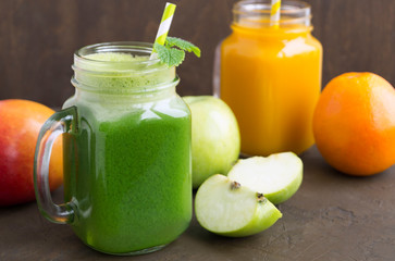 Useful fruit and vegetable juices. on dark background.