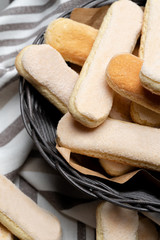 Italian Savoiardi ladyfingers Biscuits on wooden backgound with copy space
