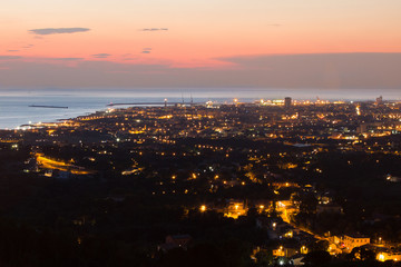 Fototapeta na wymiar Aerial View of the city of Livorno in Tuscany at Dusk