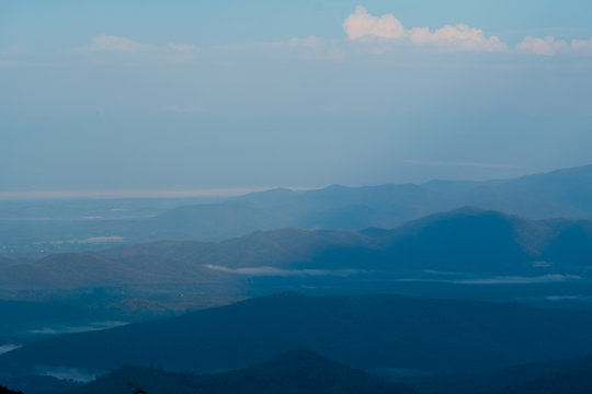 blue color of mountains layers during sunrise, Mea Kumpong, Thailand