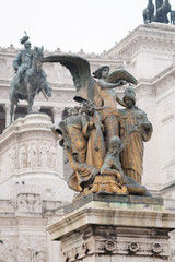 Fototapeta na wymiar Il Pensiero, The Thought sculpture at the Altar of Fatherland from Piazza Venezia, Rome, Italy. The monument is also known as National Monument to Victor Emmanuel II, Vittoriano
