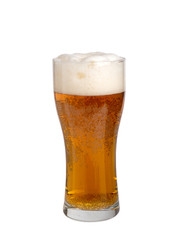A glass of beer with froth of Pils isolated on white background