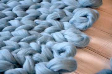 Close-up of knitted blanket, merino wool background
