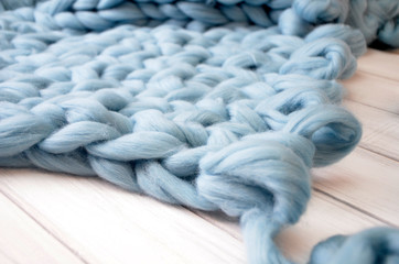 Close-up of knitted blanket, merino wool background