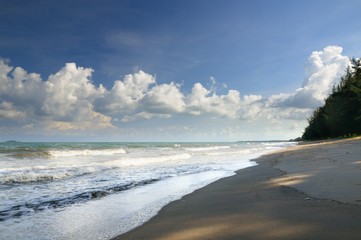 Surf on the beach during sunset on the coast of Prachuap Khiri Khan province of Thailand