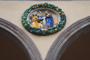 Detail of portal frieze of the Ospedale del Ceppo, Pistoia, Italy
