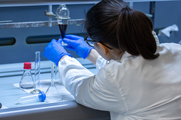 Scientist at work in chemical lab
