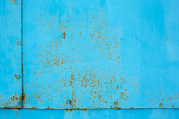 Old rusted metal texture. The surface of the blue iron wall. Perfect for background and grunge design.