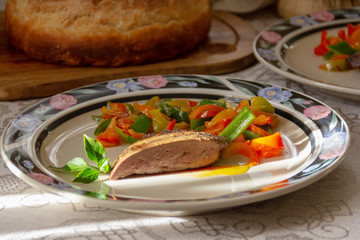 vegetable salad and a piece of liver