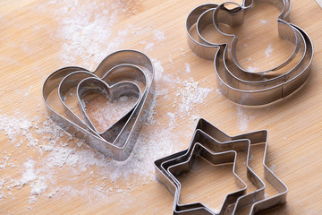 Pastry cutter on wooden board
