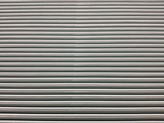 Obraz premium The stack of grey gypsum board building construction background