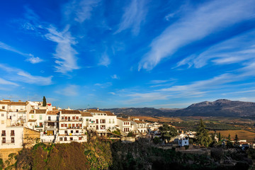 Fototapeta na wymiar Houses along the El Tajo gorge over at La Ciudad, south side of Ronda.