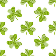 Seamless pattern with clover on a white background, for St. Patrick's Day. Excellent design for packaging, wrapping paper, textile, clothes and etc.