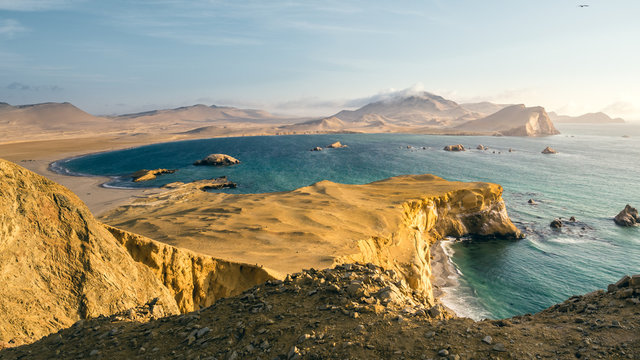 Panoramic view of the coast of Paracas in Peru during the sunset, panoramic view of the coast and the desert