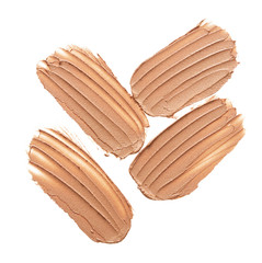 Light beige makeup smear of creamy foundation