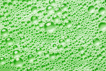 Green foam bubble texture. Abstract water washing suds pattern background.