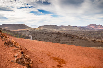 Amazing lunar landscape of Timanfaya National Park on the volcanic island of Lanzarote in Spain.