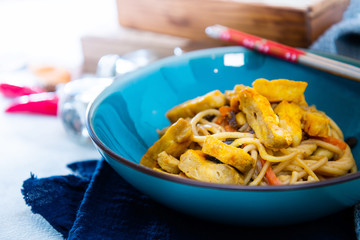 wok chicken with soy sauce noodles and vegetables