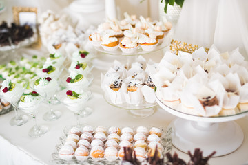 Delicious wedding reception candy bar dessert table