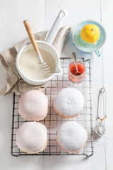 Fototapeta na wymiar Tasty and homemade donuts with white icing
